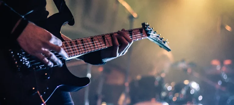 man holding a guitar rock-in-rio