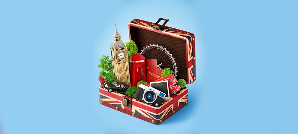 a suitcase with london's big ben & other british things
